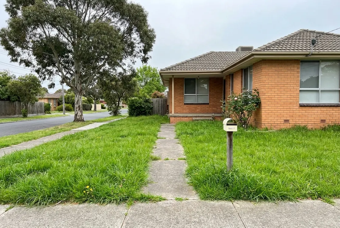 A front lawn in Mill Park that needs a cut - the photo on a new job listing